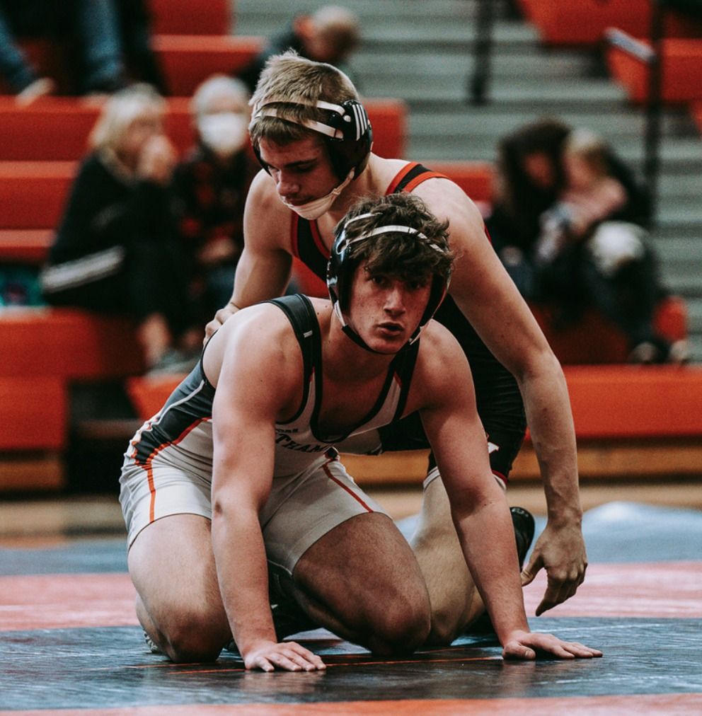 A Northampton wrestler rides his opponent