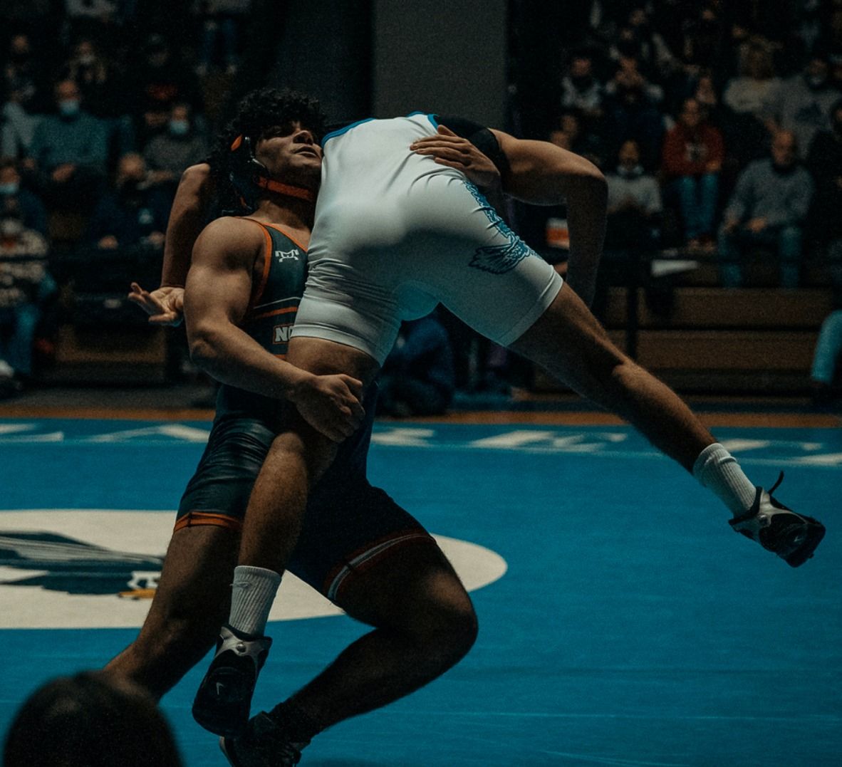 A Northampton wrestler in the blue room works for a finish