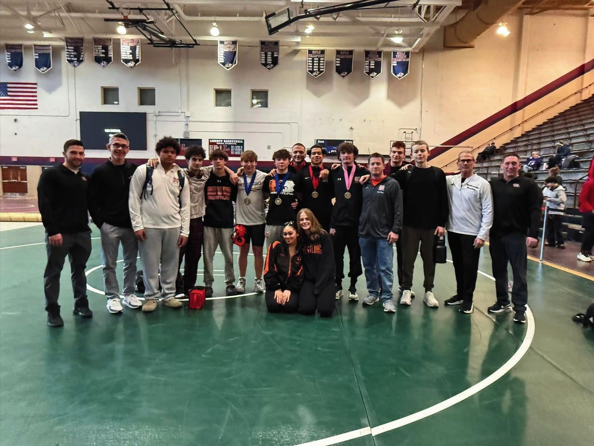 Northampton JV wrestlers and coaches at the JV district tournament