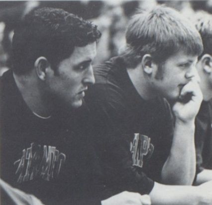 Christian Luciano and John Hard watch from the bench in Northampton shirts during the 1997–98 season