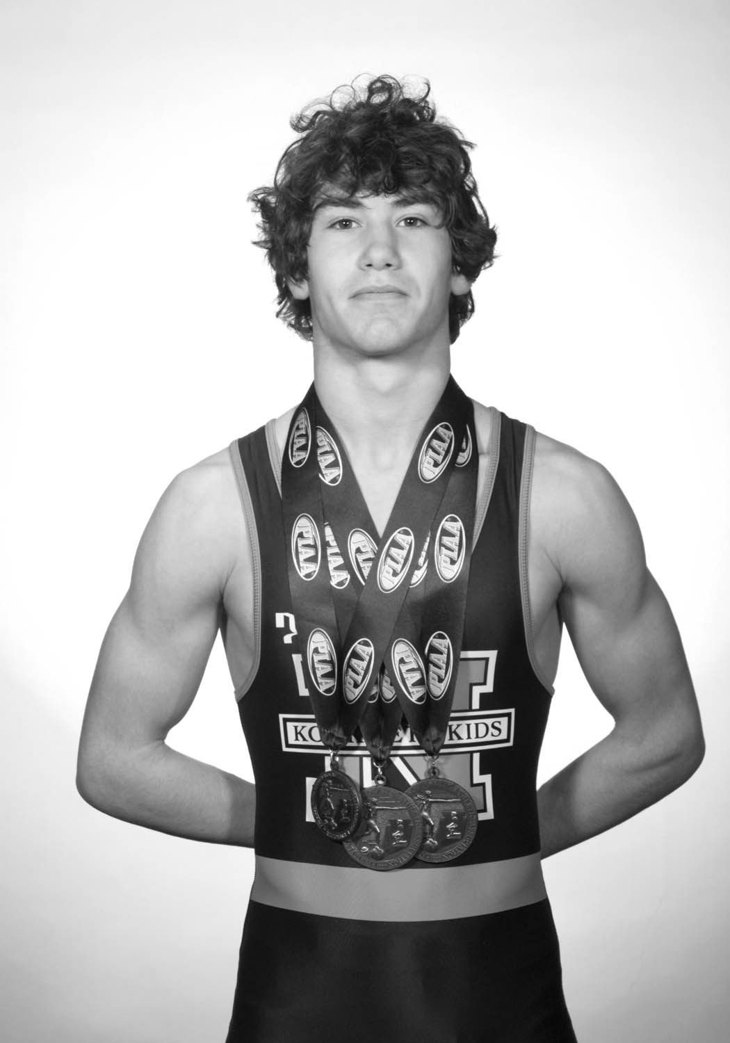 Carson Wagner wearing his 2022 medals