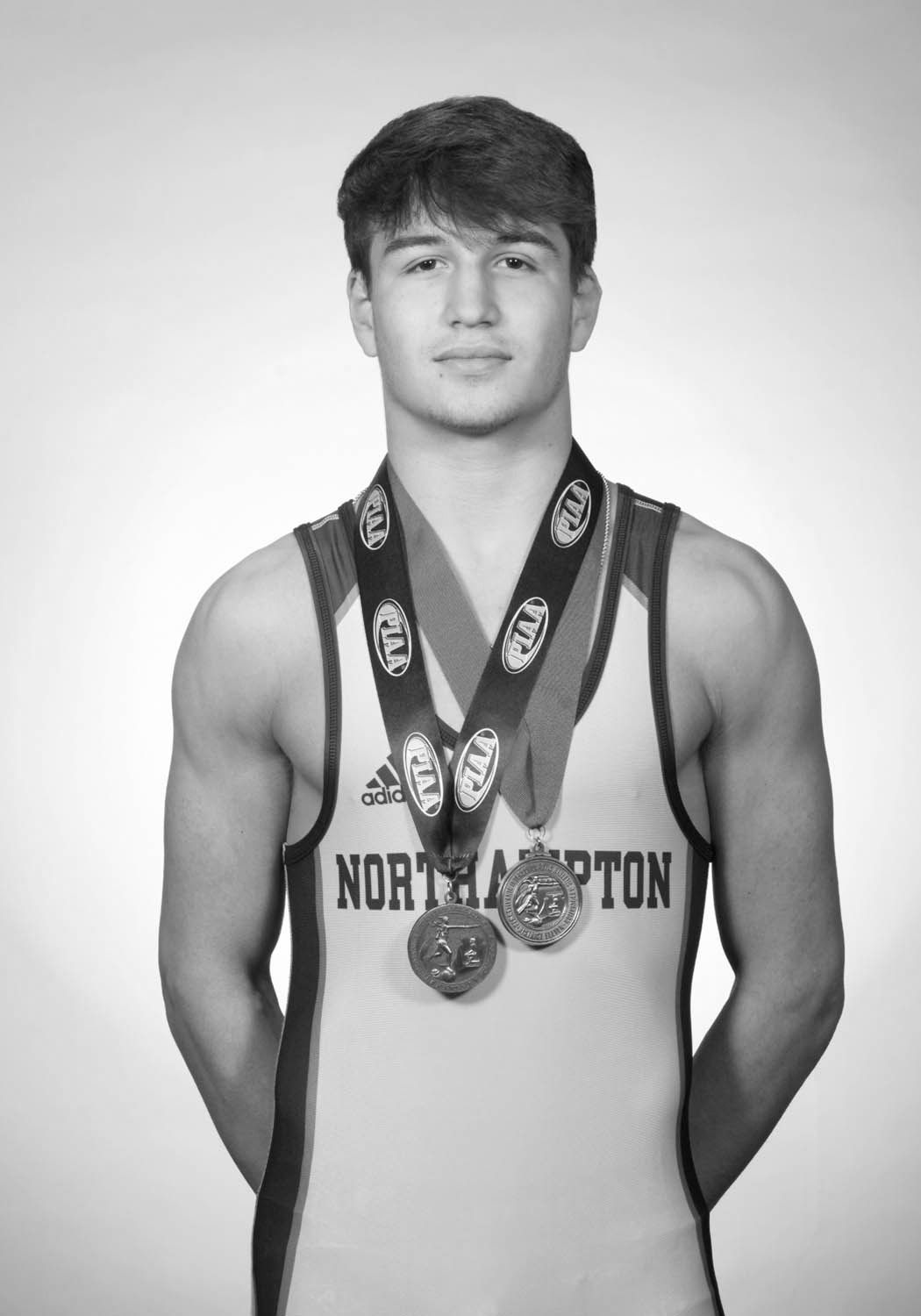 Christian Fritz wearing his 2022 medals