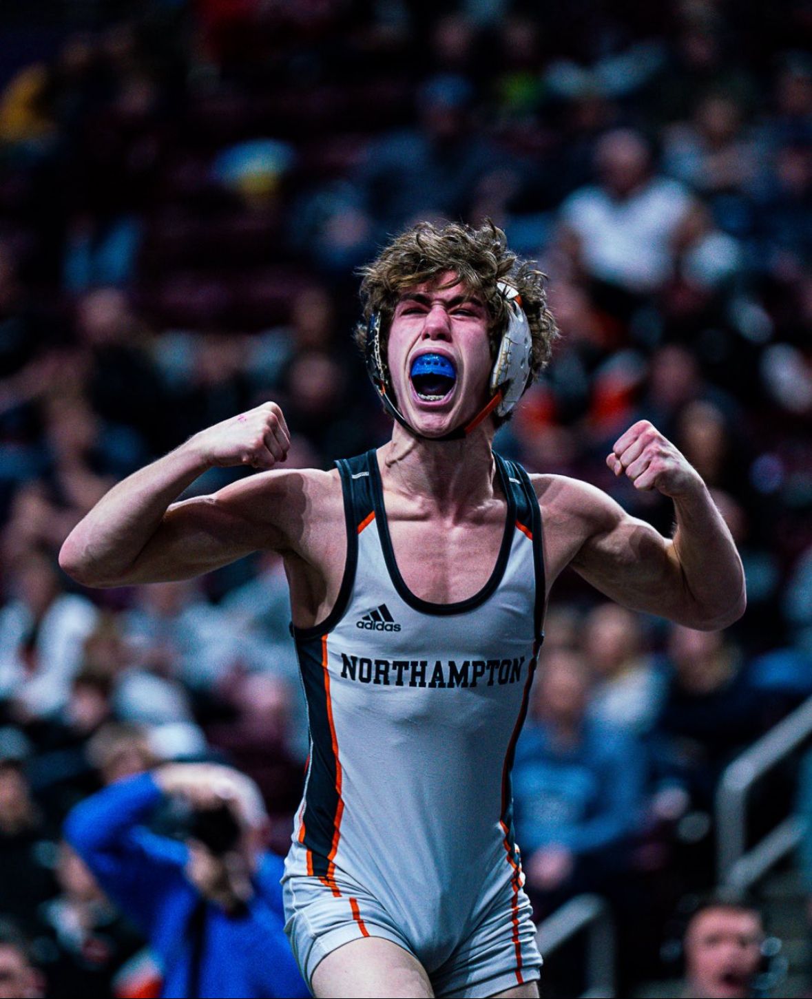 Carson Wagner roars and flexes after a last-second win at the PIAA Championships