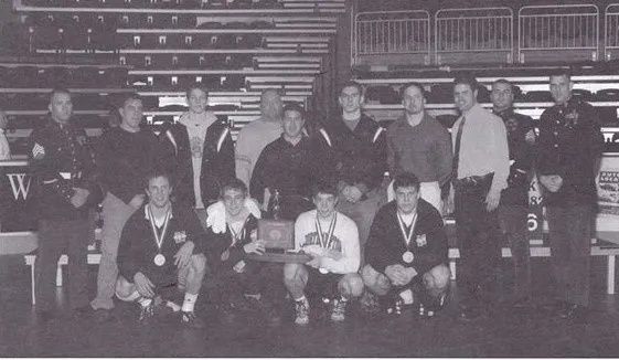The 2002–03 Northampton team and coaches with the PIAA Class AAA team championship trophy
