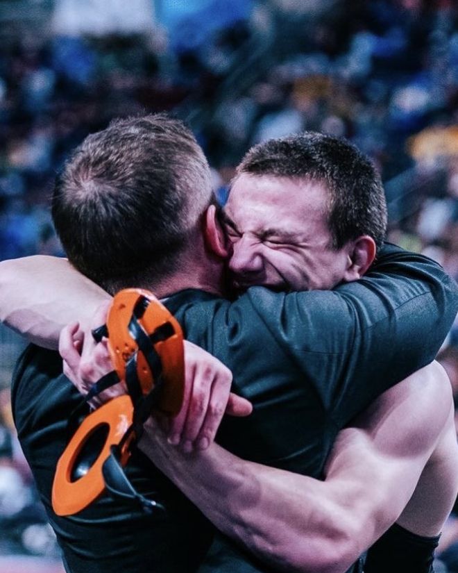 Trey Wagner hugs Coach Joe Provini after winning the 2024 state title