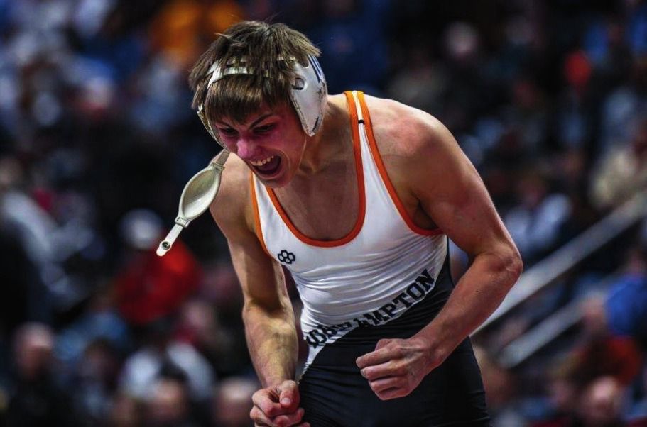 Brayden Wenrich yells and clenches his fists after a win