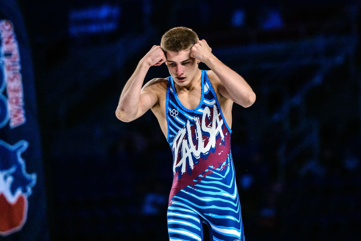Brayden Wenrich presses his fists to his head in celebration at Fargo